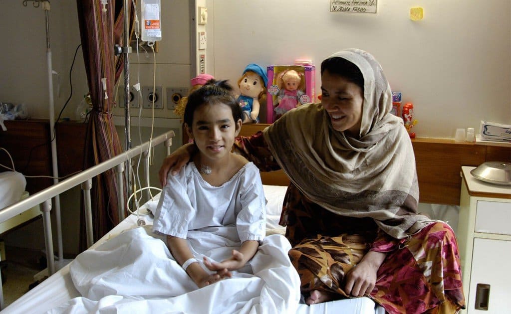 A patient and her mother at Aga Khan University Hospital. Aga Khan Foundation’s impact investing program has attracted investments from U.S.-based partners such as the Overseas Private Investment Corporation (OPIC) for social enterprises like the Aga Khan University’s hospital expansion.
